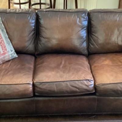 Brown overstuff sofa leather