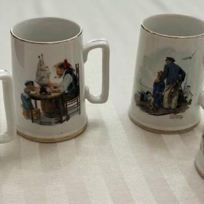 Norman rockwell mugs set of 4)