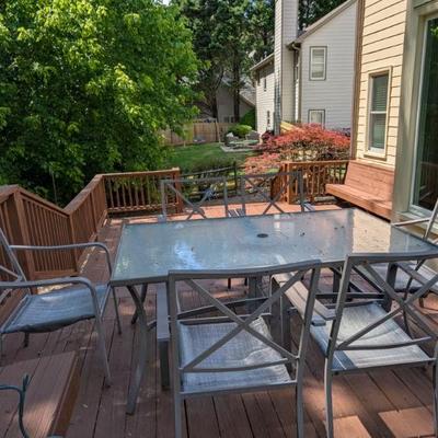Glass top patio table and chairs