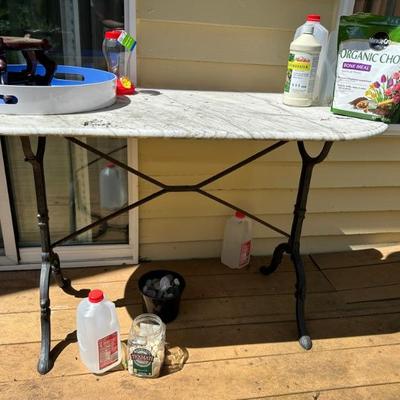 Marble top table with vintage style metal legs