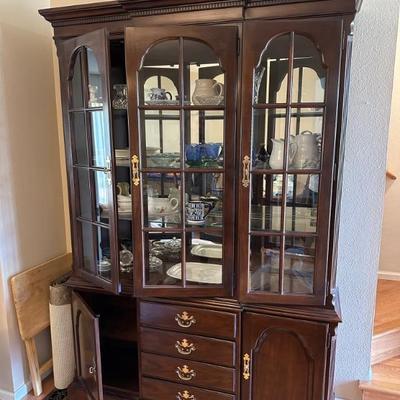 Large mirrored back china cabinet