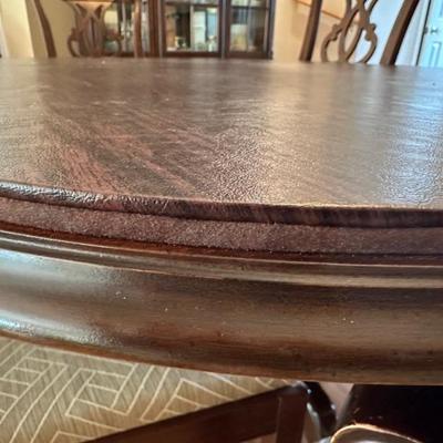 Dining table with pads - pads will fit all sizes of the table including when adding the 2 additional leaves