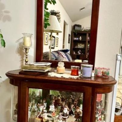 Santa’s of true world inside cabinet