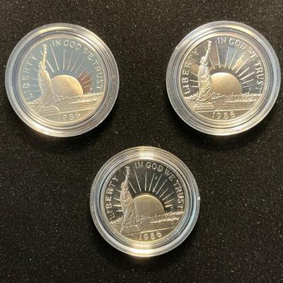 Three 1986 Proof Liberty Half-Dollars
