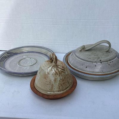 Pottery Platters And Domed Lid Storage