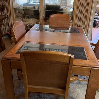 Glass Panel Dining Table with Cane Back Chairs
