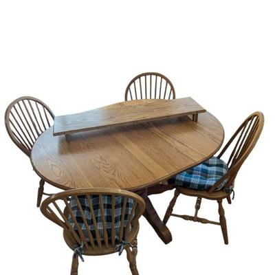 Lot #86 - Amish Round Oak Dining Table with Four Chairs & 2 Leaves