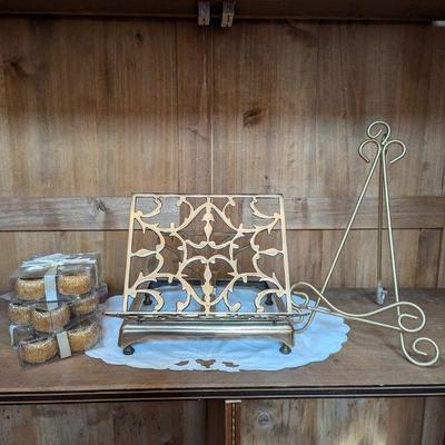 Lot #118 - Decorative Napkin Ring Sets with Brass Folding Book Stand & Gold Toned Metal Easel Stand