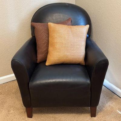 Lot #134 - Calia Italy Faux Leather Armchair With Two Ashford Court Throw Pillows