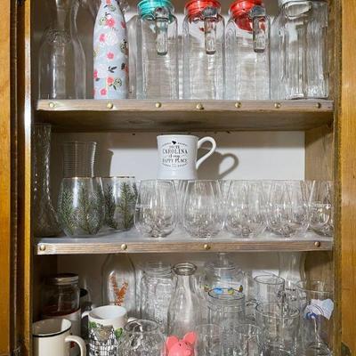 Bottles glasses and vases