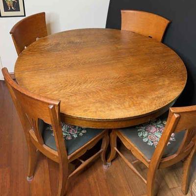 Antique dining table and chairs
