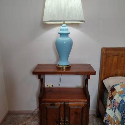 Nightstand with blue lamp
