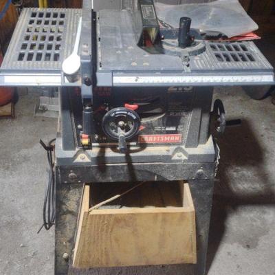 Table saw with metal stand