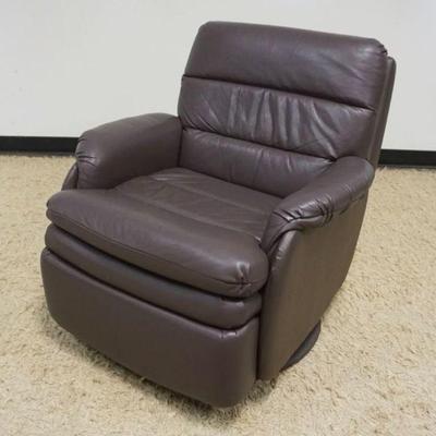 1132	BARACALOUNGER, BROWN LEATHER SWIVEL RECLINER WITH EXTENDING HEAD REST, APPROXIMATELY 32 IN X 34 IN X 31 IN H
