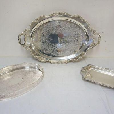 1012	GROUP OF ORNATE SILVERPLATE TRAYS, LARGEST FOOTED & APPROXIMATELY 28 IN X 18 IN

