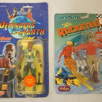1145	DEFENDERS OF THE EARTH AND ROCKETEERS TOY FIGURES IN BLISTER PACKS, 1 DATED 1985
