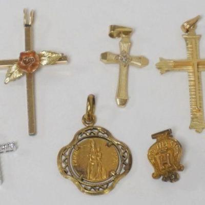 1216	GOLD CROSS PENDANTS, 3 MARKED 1.46 DWT WITH STONES, ROSE CROSS PENDANT, RELIGIOUS PENDANT AND GLEE CLUB PIN
