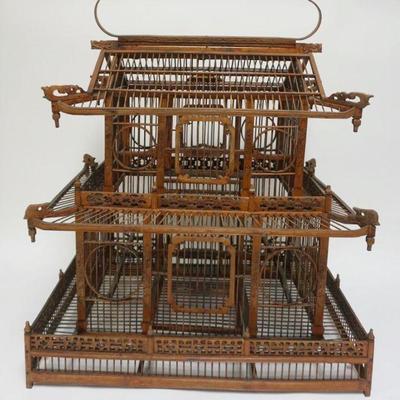 1023	ORNATE ASIAN PAGODA STYLE WOOD BIRD CAGE, APPROXIMATELY 24 IN X 16 IN X 29 IN HIGH

