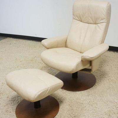 1136	PALLISER MODERN STYLE LEATHER SWIVEL RECLINER WITH FOOT STOOL, CHAIR APPROXIMATELY 32 IN X 28 IN X 40 IN H
