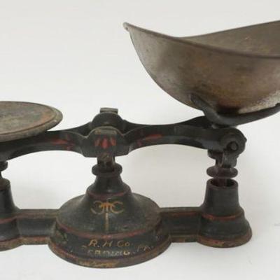 1068	FANCY ANTIQUE CAST IRON COUNTER TOP SCALE, APPROXIMATELY 13 IN X 6 IN X 8 IN H
