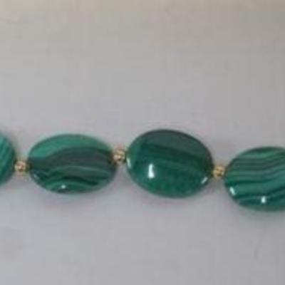 1202	14K POLISHED MOLDAVITE STONE BRACELET, 12.69 DWT WITH STONES, APPROXIMATELY 7 1/2 IN L
