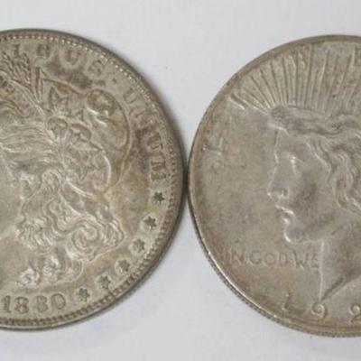 1194	1880 MORGAN AND 1923 PEACE SILVER DOLLARS
