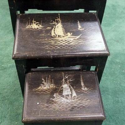 1105	NEST OF 3 LACQUERED ASIAN TABLES W/METAL INLAY OF SAILING SHIPS, FINISH WORN ON TOP, APPROXIMATELY 17 IN X 13 IN X 23 IN
