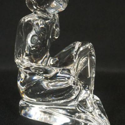 1059	BACCARAT CRYSTAL FIGURE OF WOMAN SEATED READING A BOOK, APPROXIMATELY 6 IN X 4 IN X 6 IN HIGH
