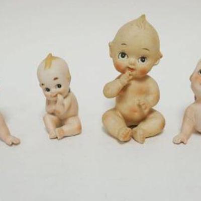 1026	GROUP OF BISQUE KEWPIE FIGURES, TALLEST APPROXIMATELY 5 1/2 IN HIGH
