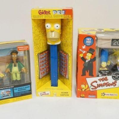 1153	THE SIMPSONS PLAYMATES FIGURES AND GIANT PEZ UNOPENED
