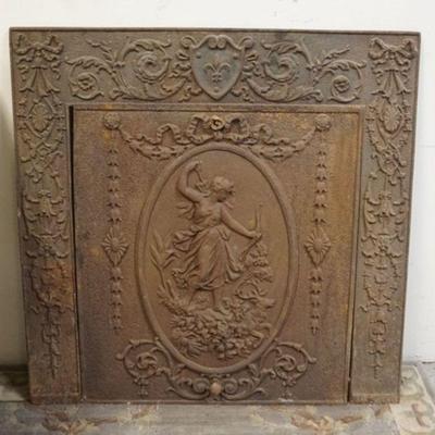 1067	ANTIQUE CAST IRON FIREPLACE COVER WITH CAST IMAGE OF VICTORIAN WOMAN, APPROXIMATELY 31 IN X 31 IN OVERALL
