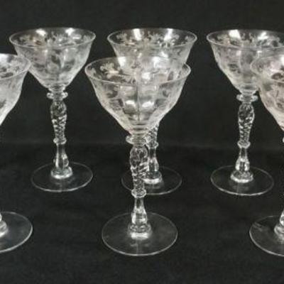 1052	10 ELEGANT ETCHED GLASS CHAMPAGNES, EACH APPROXIMATELY 7 1/2 IN HIGH
