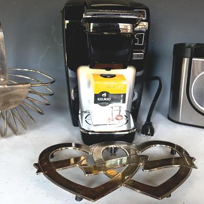 Kitchen Items w/ Keurig Coffee Maker, Chrome Heart Trivet, Basket, Simple Human Utensil Holder