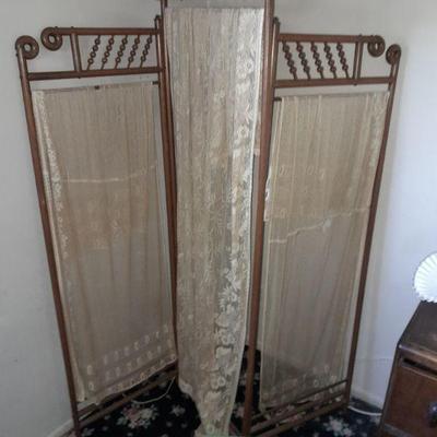 Antique wood and sheer room divider