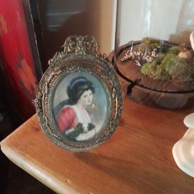 One of several antique miniatures
