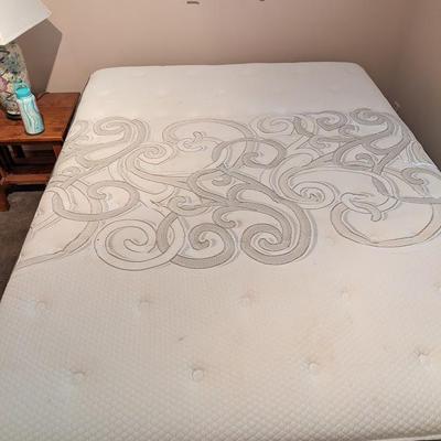 Queen sized mattress, box spring and metal frame