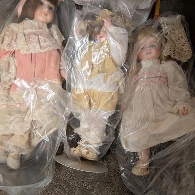 set of 4 dolls unknown maker