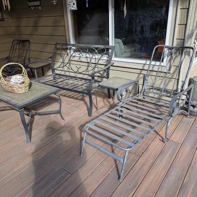 second set of metal chairs with tables