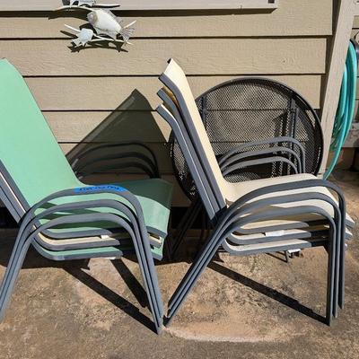 canvas chairs with a small metal table