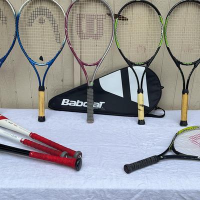 Tennis Rackets And Baseball Bats 