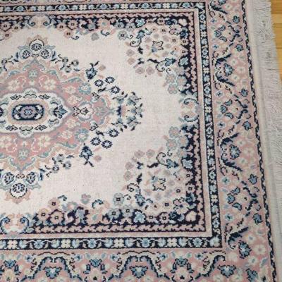 Olefin pile area rug