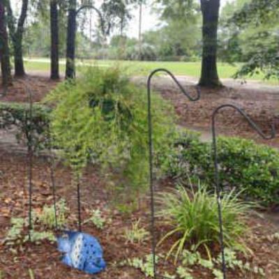 Shepherd hooks with plant