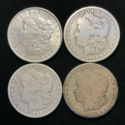 Four Morgan Silver Dollars (1900, 1901) (C38)