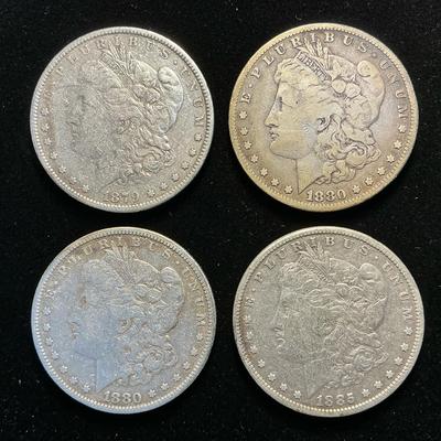 Four Morgan Silver Dollars (C34)