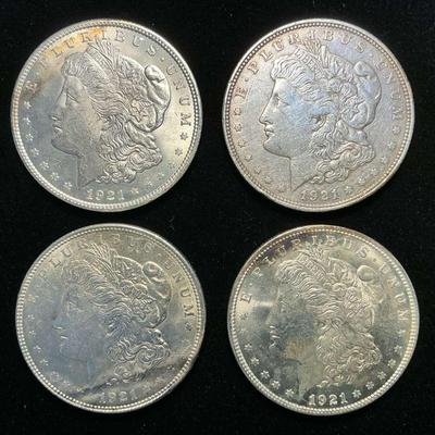 Four 1921 (P) Morgan Silver Dollars (C35)