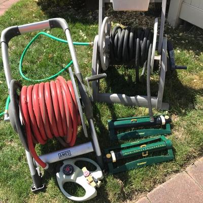 Pair Of Hose Reels With Hoses And Sprinklers