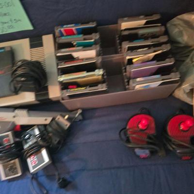 Nintendo games W/books Sold along with Nes 001
