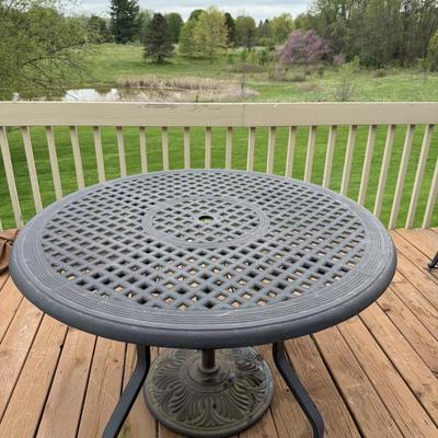 Outdoor table with umbrella