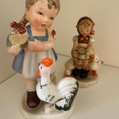 Hummel girl with rooster