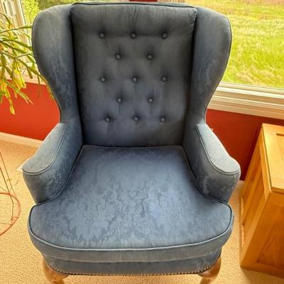 Blue wingback armchair